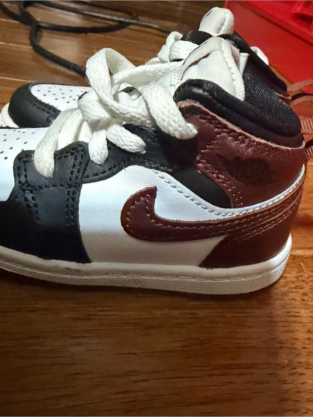Jordan Kids Black and White High-Top Sneakers with Brown Jumpman